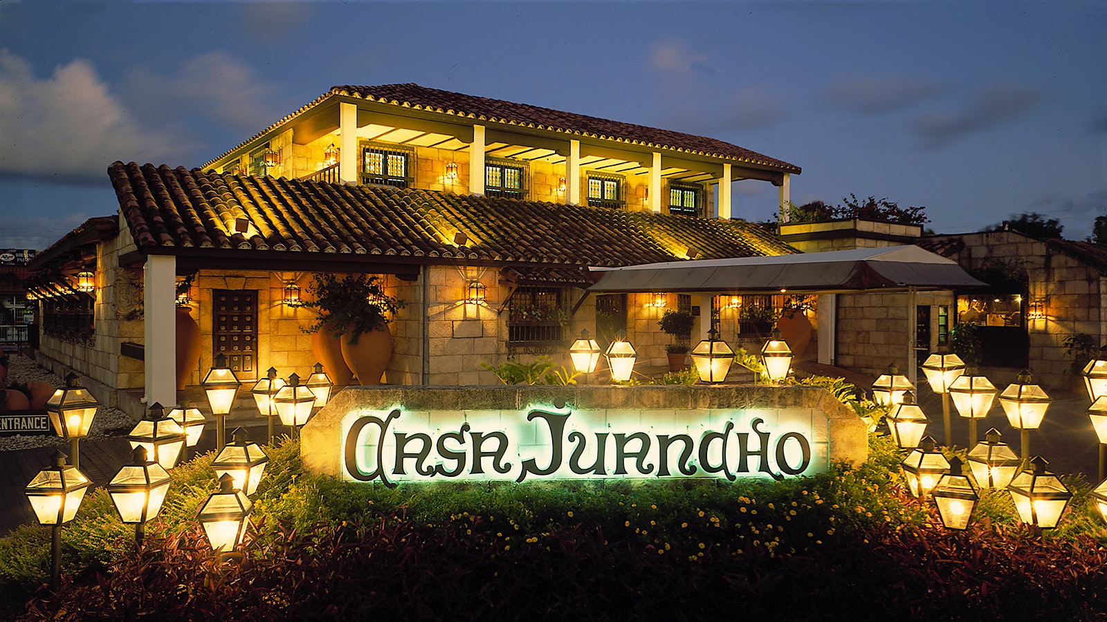 Exterior night shot of Casa Juancho